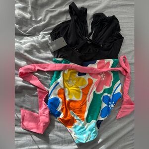 NWT unworn one piece Eloquii swimsuit with belt size 16w